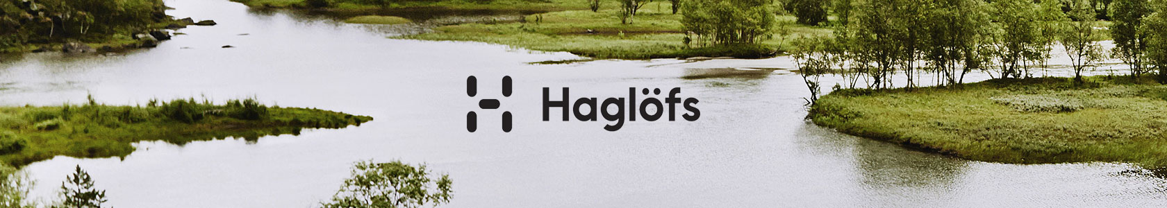 An image of a lake with the Haglofs logo in the centre