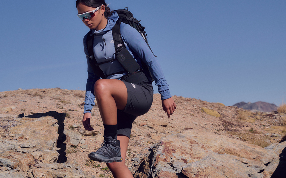A person hiking in TNF clothing