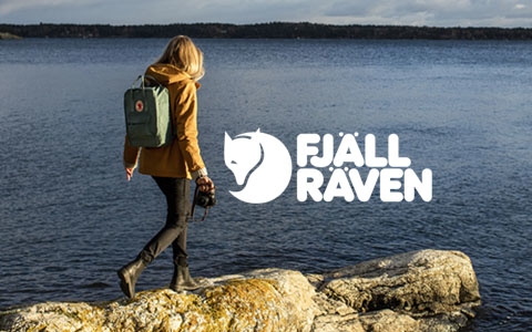 Couple hiking through the mountains with Fjallraven