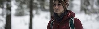 Woman in jack wolfskin coat and hat