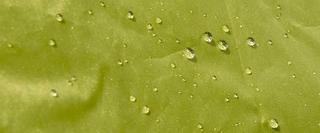 Close up of tent material with wayer droplets on