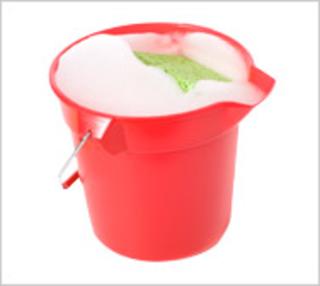 CRed bucket with soapy water