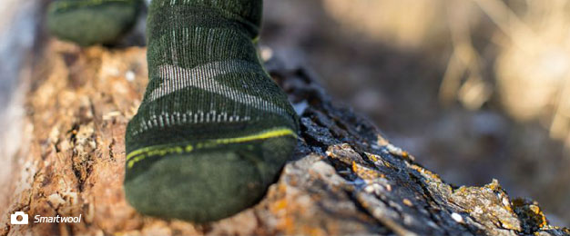 A person wearing Smartwool socks 