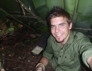 Man taking a jungle selfie