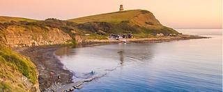 landscape view of the South West Coast Path at dusk