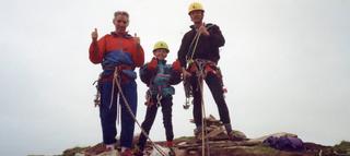 A young Leo Holding and his father and family friend atop Old Man of Hoy