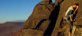 A teenaged Leo Holding climbing Satin, 57a - Stanage