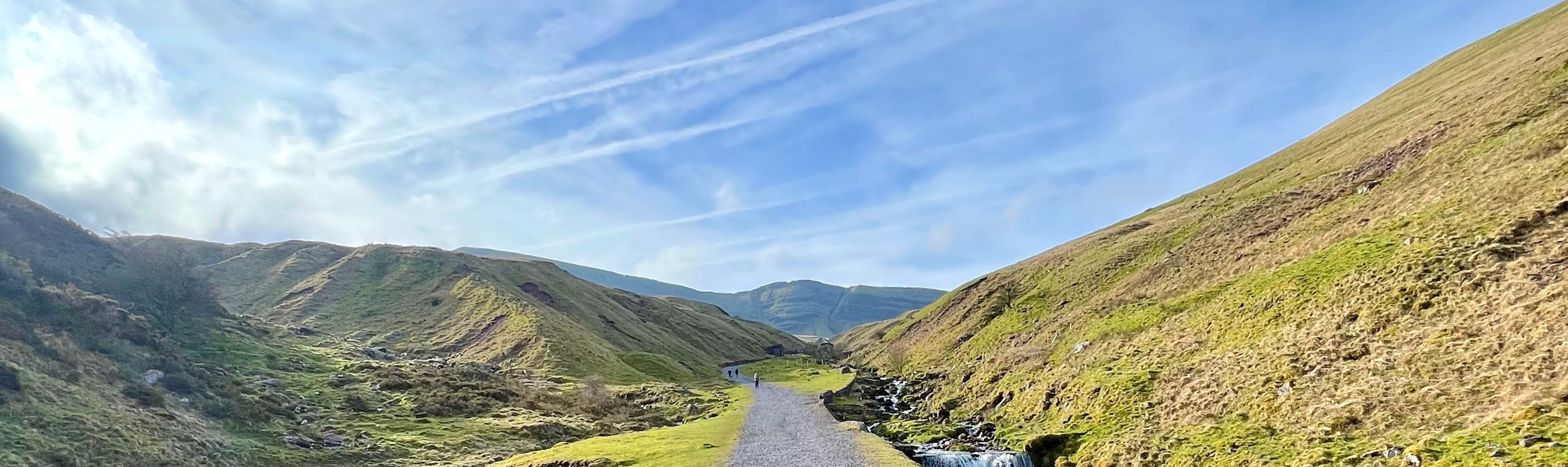 People walking together with the words 'Wherever your happy place, we've got the kit to get you there'