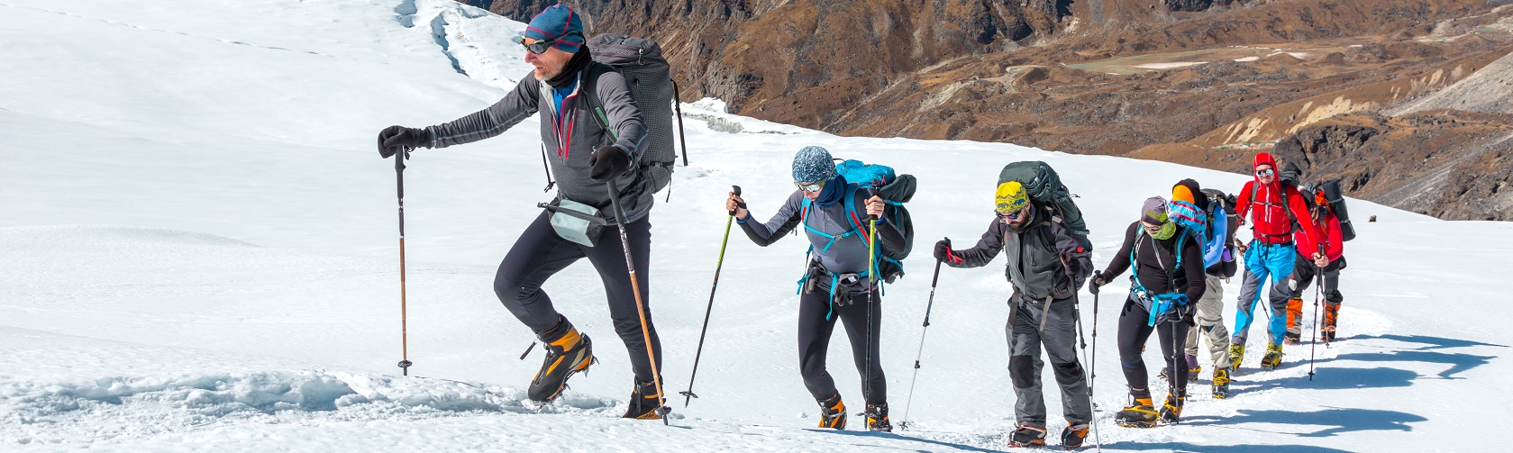 A header image of people walking through snow 