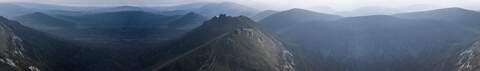 A view of mountains with foot paths