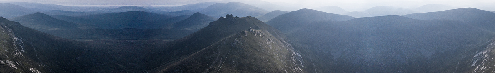 A view of mountains with foot paths