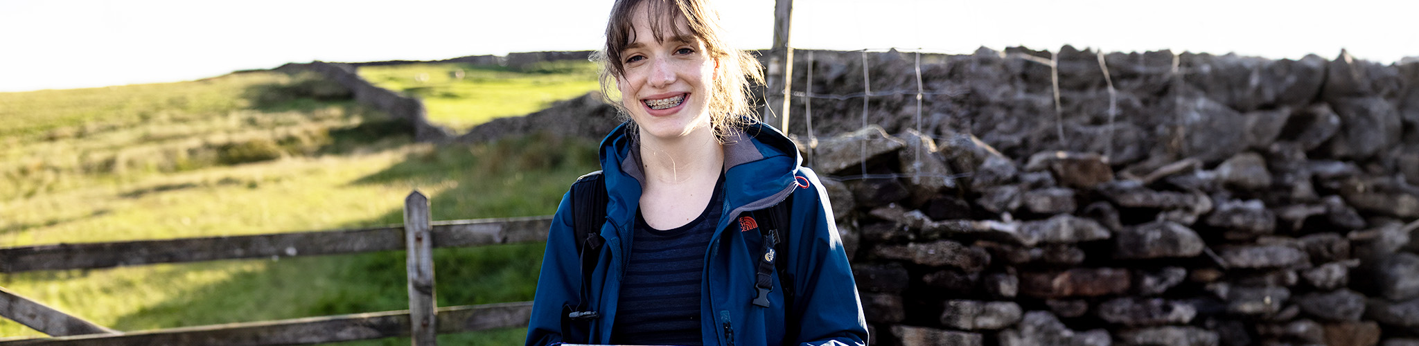 A woman wearing waterproof layers 