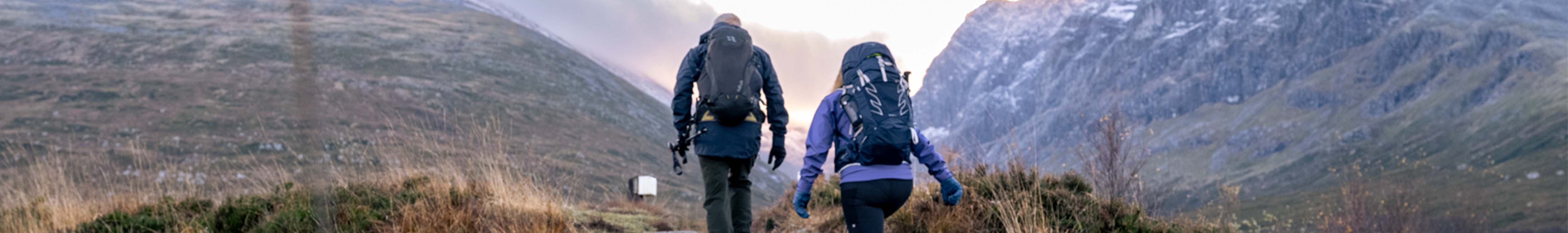 People hiking using day packs
