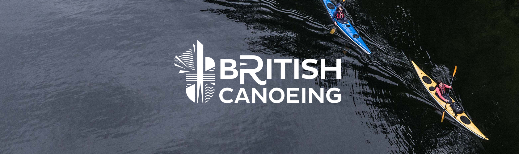 British Canoeing - person in a canoe on a lake