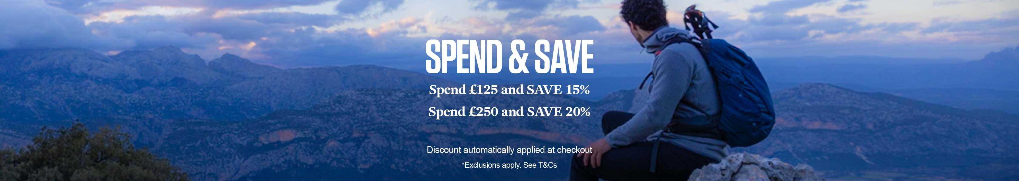 Spend & Save offer with man sitting on top of a mountain