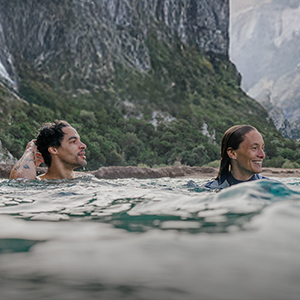 two people wild swimming
