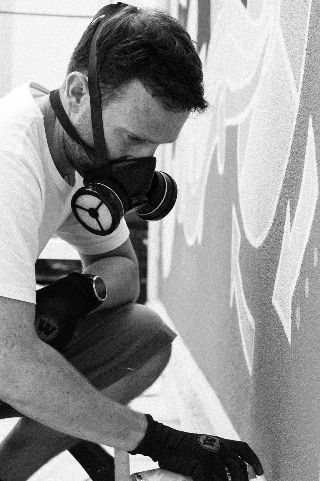 A man working in his work gloves