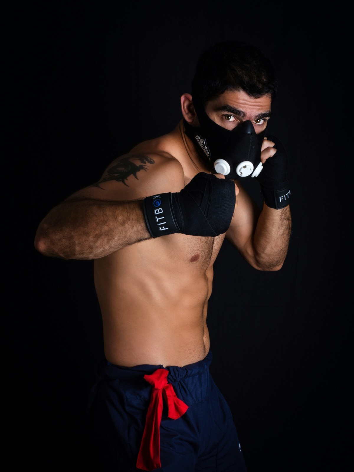 A man wearing fitness gloves