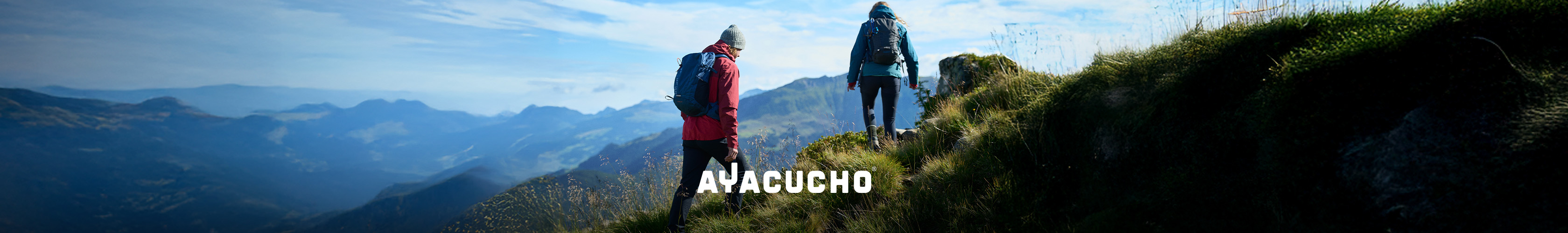 Shop Ayacucho collection. Two people walking up the mountain